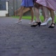 a Group of Women in Evening Dresses and Highheeled Shoes Move Synchronously on the Pavement - VideoHive Item for Sale