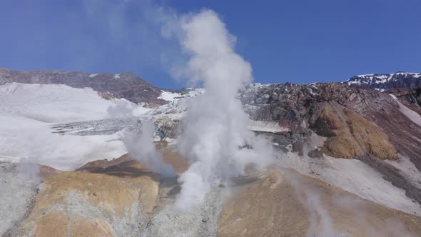 Aerial Drone Footage of Mutnovsky Volcano Crater with Fumaroles and Glacier