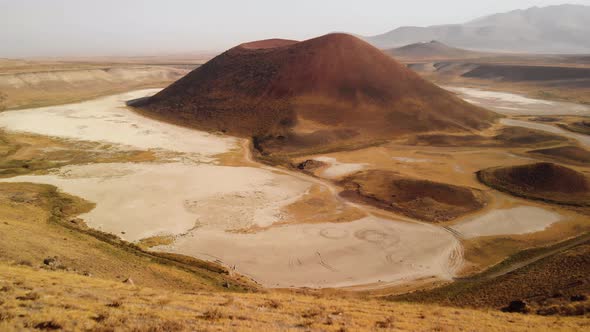 Spaceship Launch From Platform near Volcanic Cone on Mars