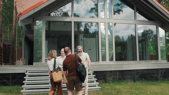 Couple Visiting Parents in Their Vacation Home