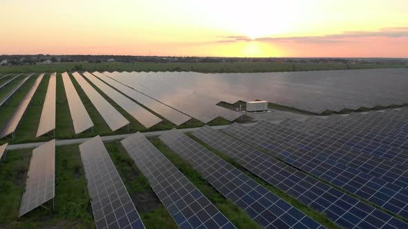 Drone Fly Over Solar Farm, Renewable Green Energy and Electrical Technology, Field of Solar Panels