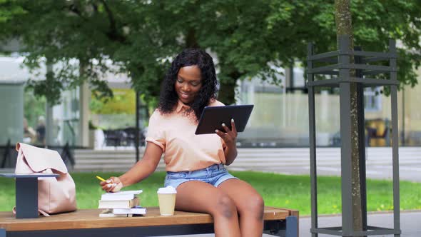 Happy African Student Girl with Tablet Pc in City