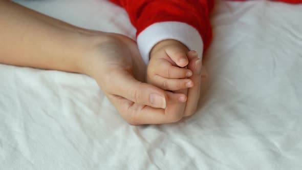 Baby Santa With Hand Mom