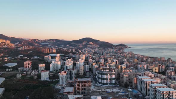 Colorful sunset over the city Aerial View 4 K Alanya Turkey