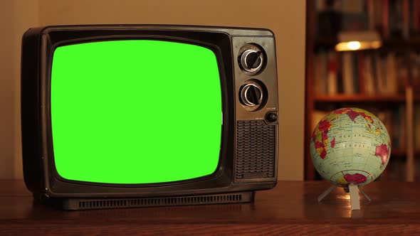 Old TV Set with Green Screen and Terrestrial Globe. 4K Version.