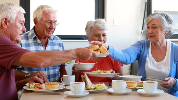 Senior citizens having breakfast