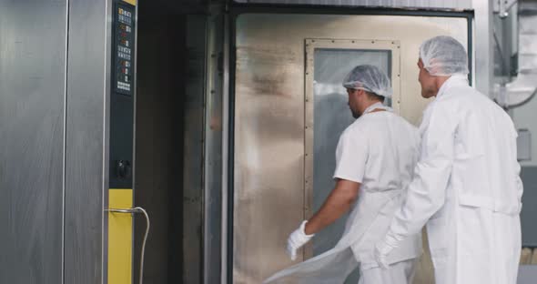 Bakery Engineer and His Assistance in a White