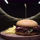 Appetizing Beef Burger Rotating on the Wooden Desk - VideoHive Item for Sale