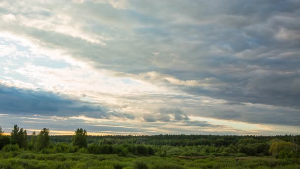 Epic Clouds With Sunset Over The Forest, Time Lapse