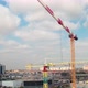 Working Cranes in the city, Building in the Process of Construction. - VideoHive Item for Sale