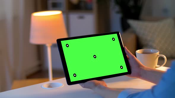 Hands Holding Tablet Pc with Green Screen at Home 6