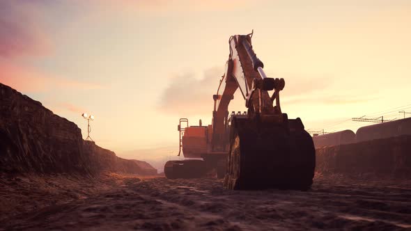 Excavator or digger at construction Site during sunset. Heavy industry. 4k HD