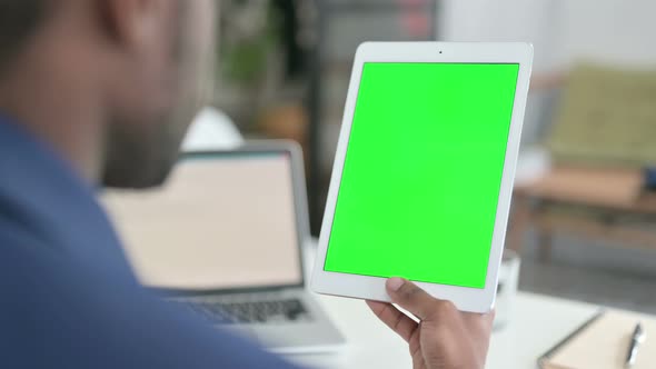 Businessman Using Tablet with Green Chroma Key Screen