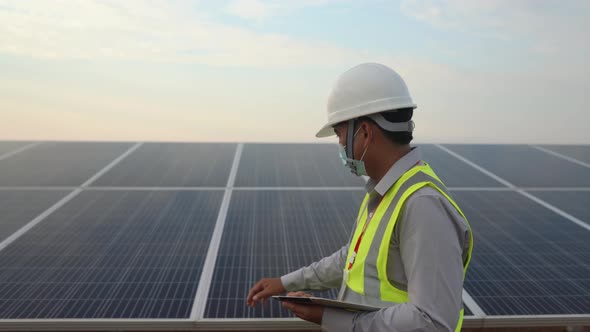 Engineers Working To Power Solar Panel Renewable Power Plants In Thailand.