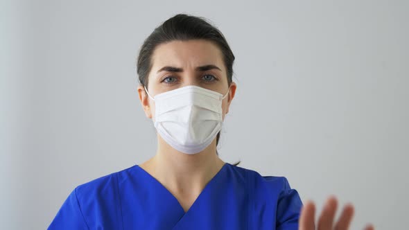 Female Doctor or Nurse Showing Clean Hand