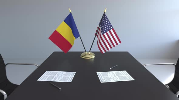 Flags of Romania and the United States of America and Papers alt