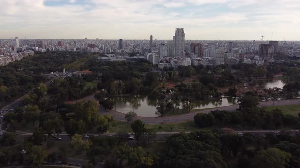 Palermo lakes area and Buenos Aires City in background, Argentina. Aerial forward