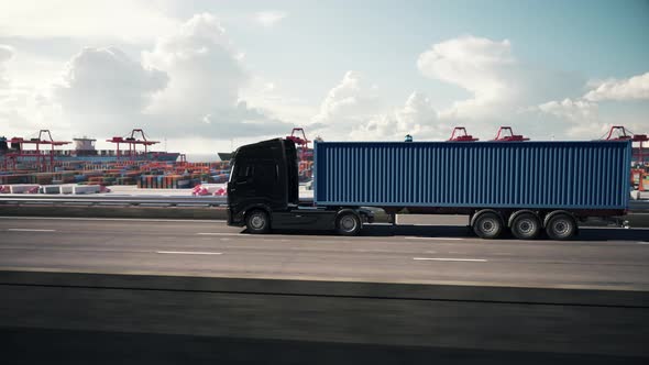 Cargo truck with container driving to the port