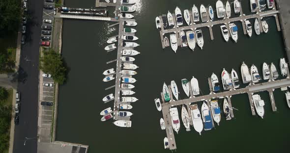 Top Down Aerial Panning of Boats Docked at a Marina