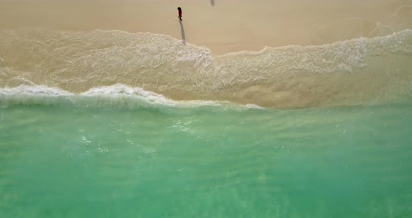 Natural overhead abstract view of a paradise sunny white sand beach and blue water background in hi 