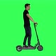 Riding an Electric Scooter by A Casual Looking Young Man.Turns Left and Right Over a Green Screen - VideoHive Item for Sale