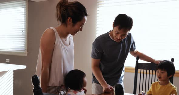 Family enjoying time relaxing together at home