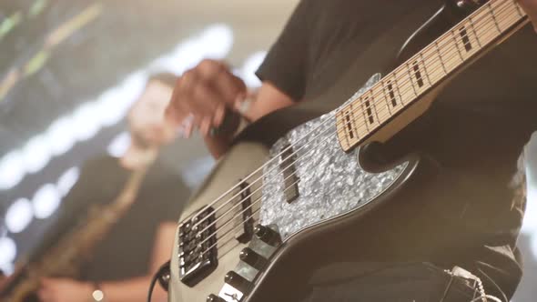 Man Playing the Electro Guitar on the Concert Closeup