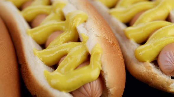 hot dog with mustard close up, rotation, Classic hot dog with mustard