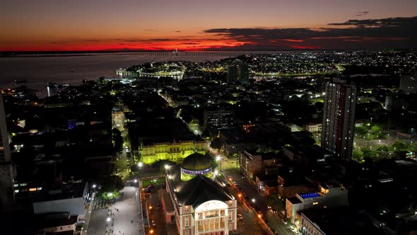 Sunset sky over downtown Manaus Brazil. Cityscape tourism landmark.