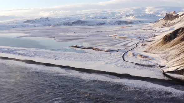 The Black Sand Beach and Incredible Landscape of Iceland Seen From The Air