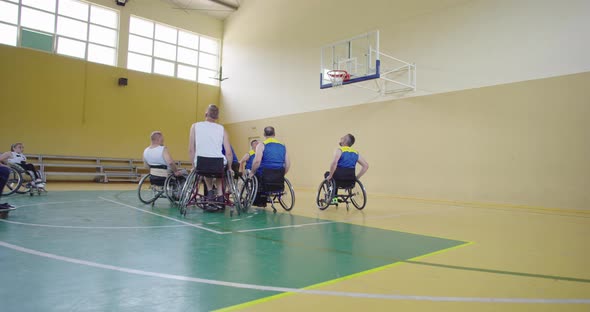 Persons with Disabilities Playing Basketball in the Modern Hall