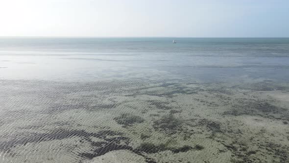 Aerial View of the Indian Ocean Near the Shore of the Island of Zanzibar Tanzania Slow Motion