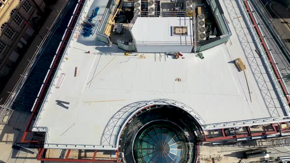 Top down aerial footage of renovation work being done on The Majestic building in the UK