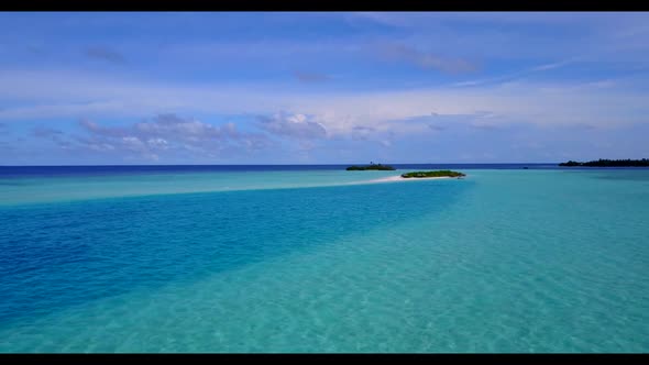 Aerial drone sky of marine island beach holiday by blue green lagoon with white sandy background of 