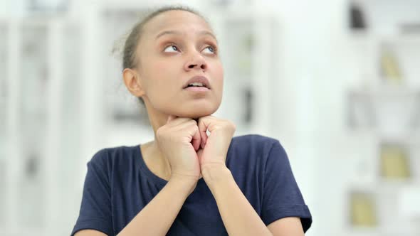 Portrait of Young African Woman Getting Scared