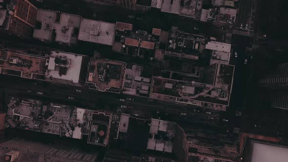 AERIAL: Overhead View of Skyscraper Building Rooftops in Manhattan New York City at Dawn After