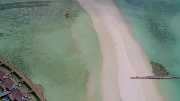 Drone aerial scenery of tourist beach by lagoon and sand background