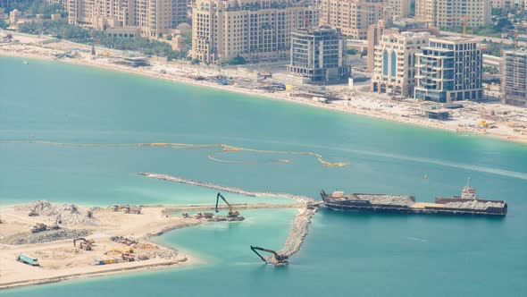 Cargo Tanker and Various Construction Equipment Build an Artificial Island in Dubai