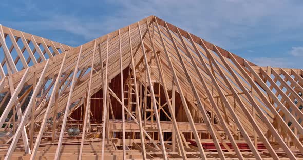 View of Roof Truss System Beams Wooden Frame House Under Construction