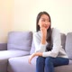 Asian woman sit on sofa and relax - VideoHive Item for Sale