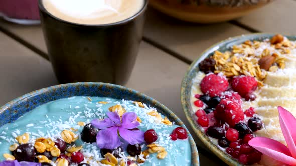 Top View of Raw Food Acai Smoothie with Fresh Fruits Berries Granola