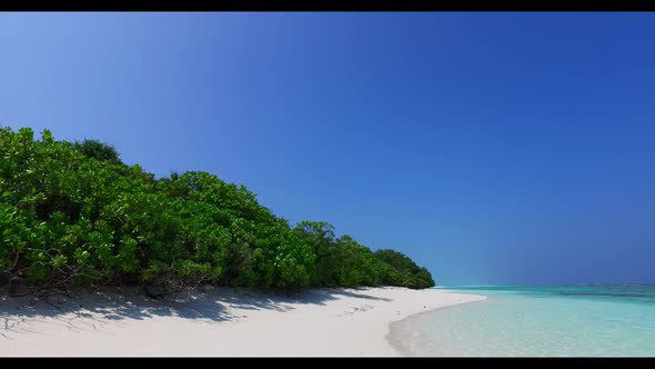 Aerial texture of marine shore beach voyage by turquoise ocean and white sand background of a dayout