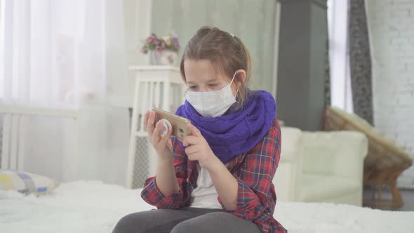 Teenage Girl with a Medical Mask