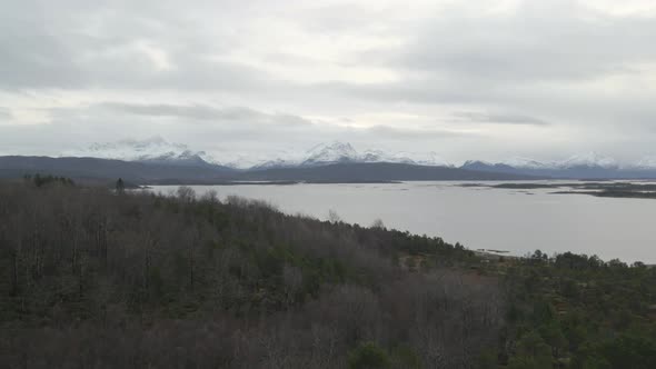 Snowy mountain range in Arctic Circle, drone view in Northern Norway