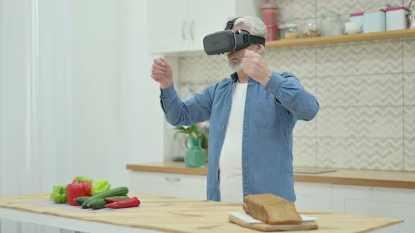 Modern Old Woman Using VR Set While Standing in Kitchen