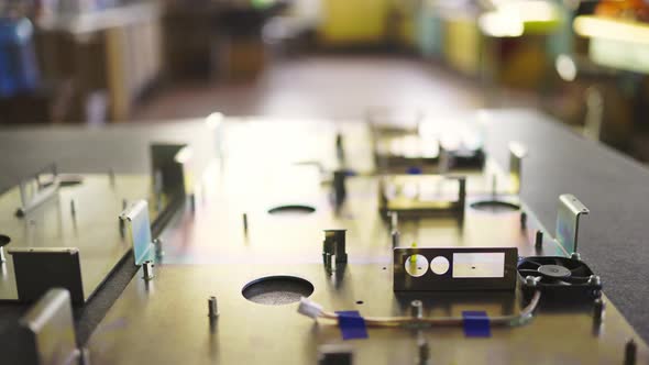 Slider Shot of a Blank Metal Components in Workshop Laboratory