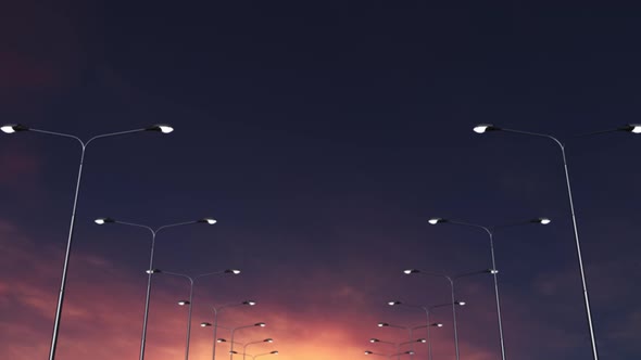 Road Lighting on the Highway at Evening Sunset