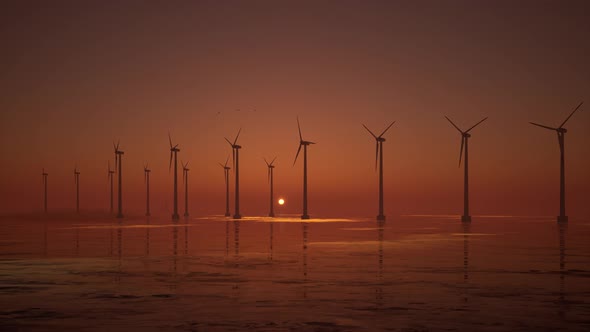 3D animation of offshore wind turbines at sunset. Wind Farm, renewable energy.