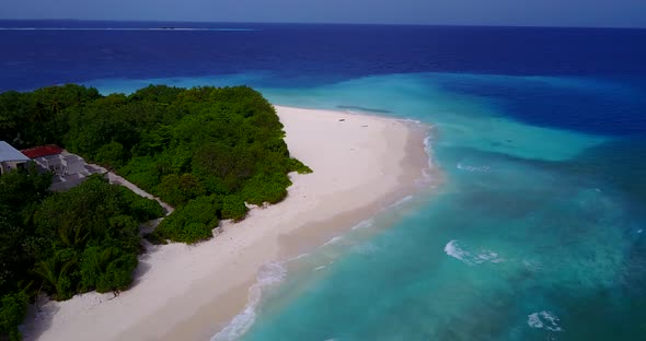 Beautiful drone abstract view of a summer white paradise sand beach and blue sea background in vibra