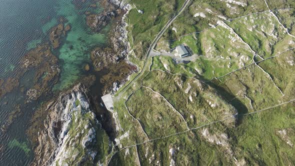 Rocky Field Landscape By The Sea Coast In Connemara, Ireland On A Hot Summer Day - aerial